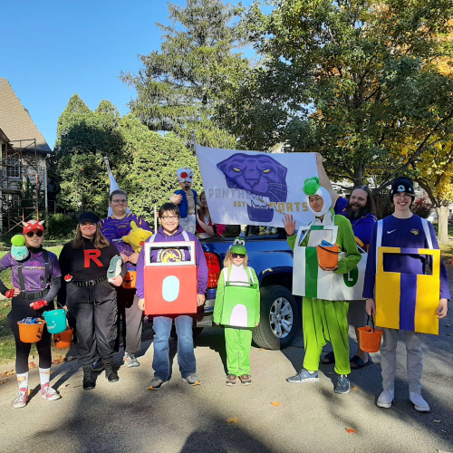 Panther Esports members posing for the 2023 homecoming parade in Mario Kart costumes.